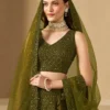 🫒 Rich Olive Green Georgette Body — sophisticated, earthy & universally flattering 🧵 Delicate Thread Embroidery — intricate handcraft detailing across the full lehenga ✨ Sequin Work Throughout — soft shimmer that glows beautifully in evening light 👘 Matching Georgette Choli — fully embroidered for a seamless head-to-toe look 🧣 Soft Net Dupatta — sequin accents and lace borders on all sides for ethereal finish 📐 Semi-Stitched up to 42 inches — fits most sizes comfortably ✂️ Unstitched Choli Material — stitch to your exact measurements for perfect fit 📦 Custom Size Available — XS, S, M, L, XL or fully custom 🏪 Pickup Available — ready in 24 hours from store ✅ Perfect For — receptions, evening functions, weddings, sangeet, festive occasions