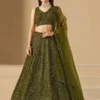 🫒 Rich Olive Green Georgette Body — sophisticated, earthy & universally flattering 🧵 Delicate Thread Embroidery — intricate handcraft detailing across the full lehenga ✨ Sequin Work Throughout — soft shimmer that glows beautifully in evening light 👘 Matching Georgette Choli — fully embroidered for a seamless head-to-toe look 🧣 Soft Net Dupatta — sequin accents and lace borders on all sides for ethereal finish 📐 Semi-Stitched up to 42 inches — fits most sizes comfortably ✂️ Unstitched Choli Material — stitch to your exact measurements for perfect fit 📦 Custom Size Available — XS, S, M, L, XL or fully custom 🏪 Pickup Available — ready in 24 hours from store ✅ Perfect For — receptions, evening functions, weddings, sangeet, festive occasions