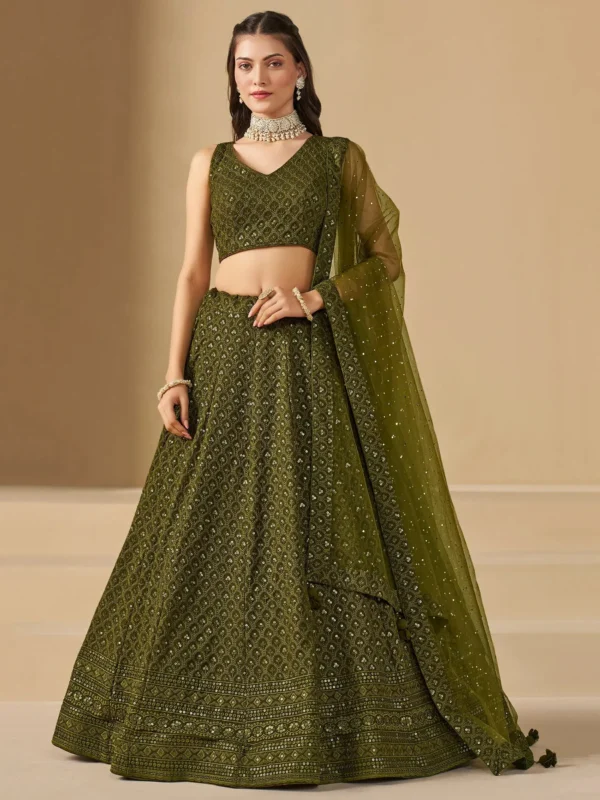 🫒 Rich Olive Green Georgette Body — sophisticated, earthy & universally flattering 🧵 Delicate Thread Embroidery — intricate handcraft detailing across the full lehenga ✨ Sequin Work Throughout — soft shimmer that glows beautifully in evening light 👘 Matching Georgette Choli — fully embroidered for a seamless head-to-toe look 🧣 Soft Net Dupatta — sequin accents and lace borders on all sides for ethereal finish 📐 Semi-Stitched up to 42 inches — fits most sizes comfortably ✂️ Unstitched Choli Material — stitch to your exact measurements for perfect fit 📦 Custom Size Available — XS, S, M, L, XL or fully custom 🏪 Pickup Available — ready in 24 hours from store ✅ Perfect For — receptions, evening functions, weddings, sangeet, festive occasions