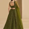 🫒 Rich Olive Green Georgette Body — sophisticated, earthy & universally flattering 🧵 Delicate Thread Embroidery — intricate handcraft detailing across the full lehenga ✨ Sequin Work Throughout — soft shimmer that glows beautifully in evening light 👘 Matching Georgette Choli — fully embroidered for a seamless head-to-toe look 🧣 Soft Net Dupatta — sequin accents and lace borders on all sides for ethereal finish 📐 Semi-Stitched up to 42 inches — fits most sizes comfortably ✂️ Unstitched Choli Material — stitch to your exact measurements for perfect fit 📦 Custom Size Available — XS, S, M, L, XL or fully custom 🏪 Pickup Available — ready in 24 hours from store ✅ Perfect For — receptions, evening functions, weddings, sangeet, festive occasions